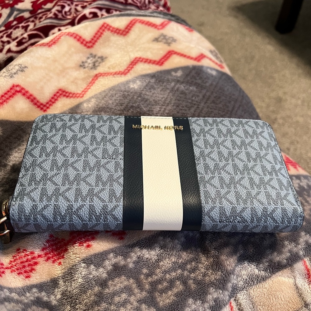 Michael Kors large stripe continental wallet.